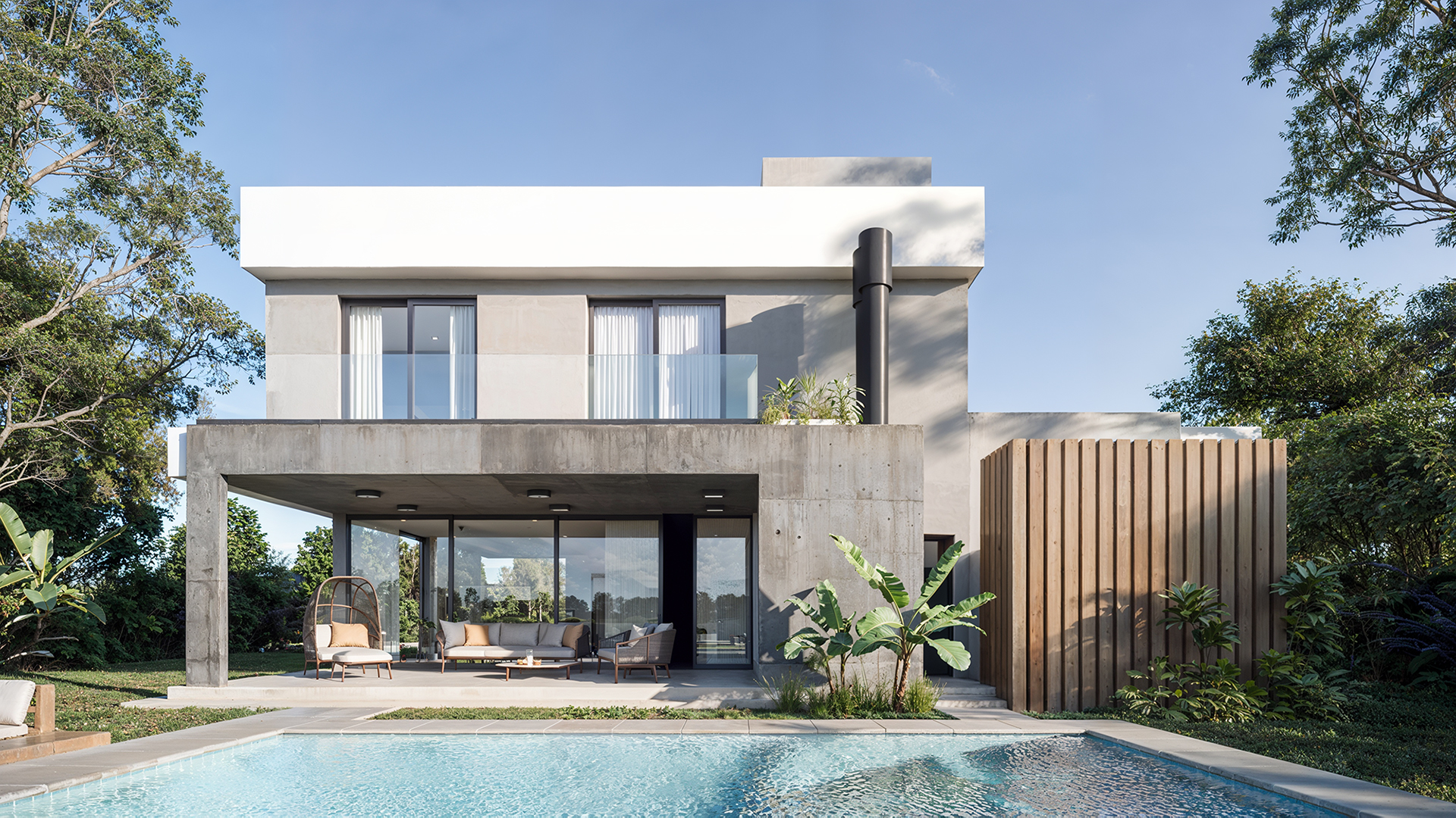 Render de casa moderna de hormigón y blanco con una piscina en primer plano